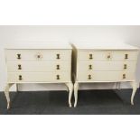 A pair of white painted chests of drawers with gilt decoration, size 80 x 48cm.