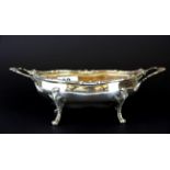 A hallmarked silver oval bowl raised on four feet, size 25 x 12 x 7cm.