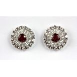A pair of 925 silver ruby and white stone set earrings, Dia. 1.5cm.