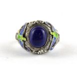 A 925 silver adjustable ring with enamel and blue stone.