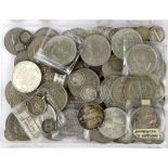 A box of mixed British silver and other coins.