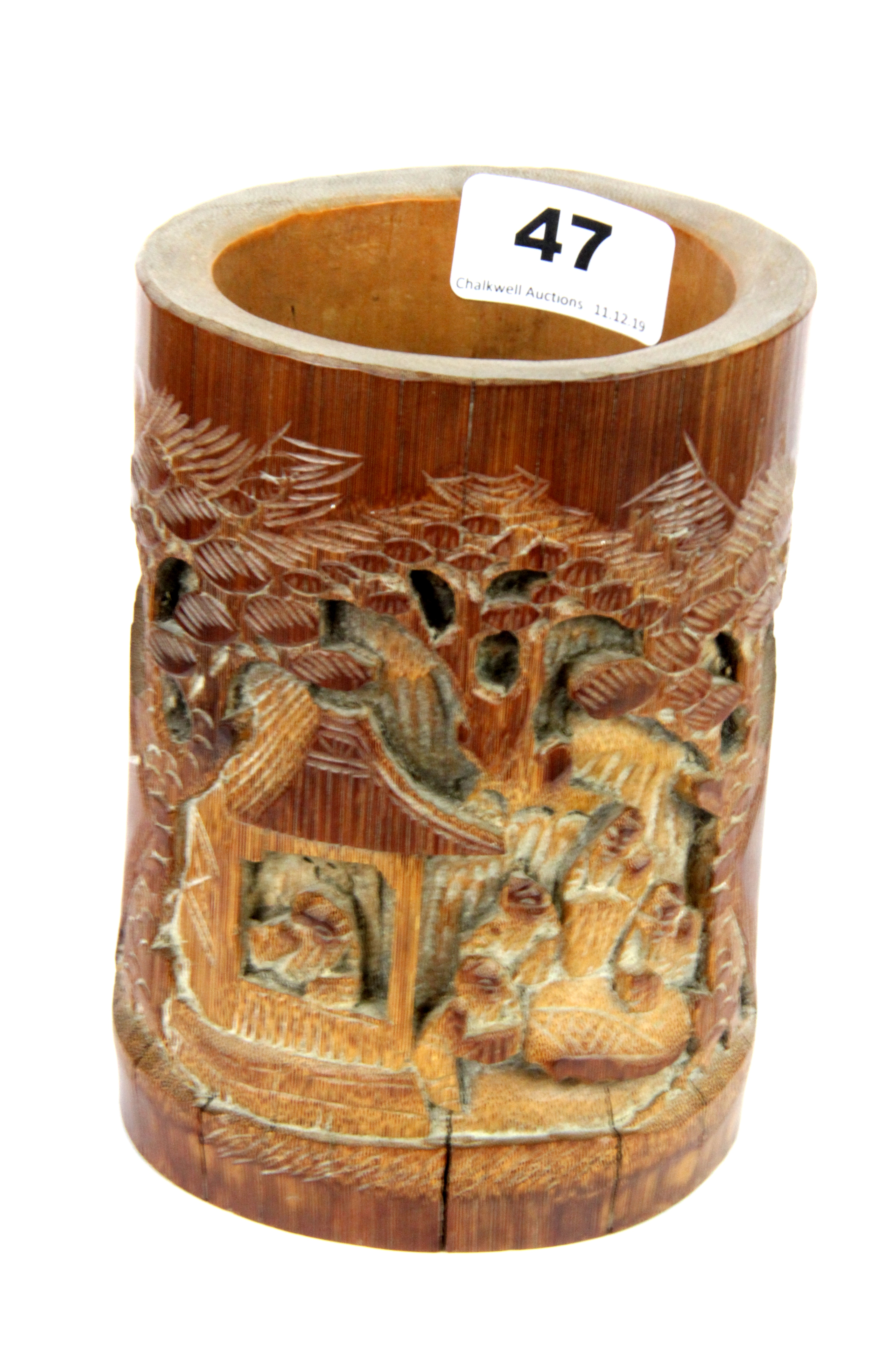 A mid 20thC Chinese carved bamboo brush pot, H. 15cm.