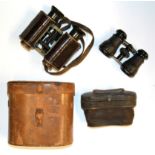 A cased pair of Trieder binoculars together with a cased pair of opera glasses.