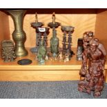 A Chinese carved hardwood figure together with a group of bronze and other items, figure H. 31cm.