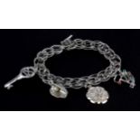 A sterling silver charm bracelet, L. 18cm.