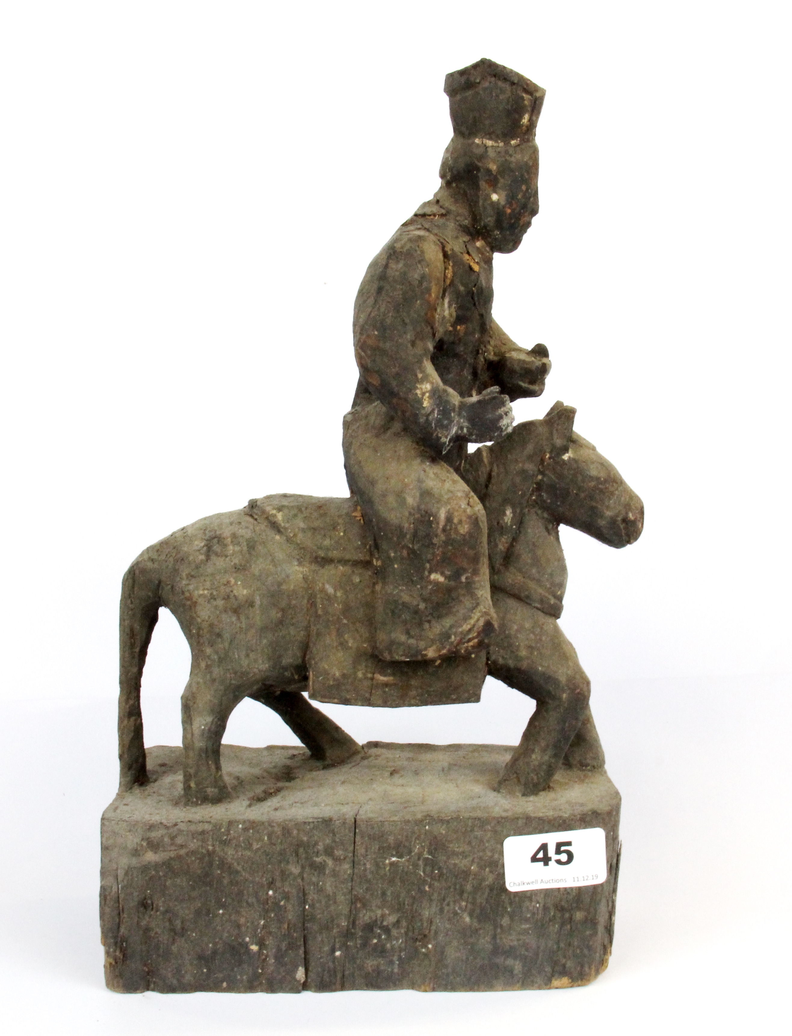 A rare Chinese Qing dynasty carved wooden figure of a deity riding a horse with a prayer cavity in - Image 3 of 4