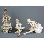 Two Lladro ballet dancer figurines and a further Lladro flamenco dancer figurine, tallest 24cm. (one