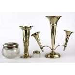 A hallmarked silver bud vase, with a silver epergne and two silver topped glass boxes.