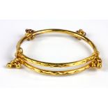 A 22ct yellow gold (stamped 22ct) baby bangle, Dia. 4cm.