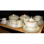 A Wedgwood dinner service together with a Royal Albert Burlington pattern part tea set.