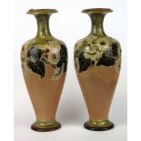 A pair of Royal Doulton stoneware vases, H. 27cm (one repair to foot).