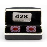 A boxed pair of 925 silver carved cornelian set cufflinks.