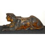 A 19th century carved hardwood figure of a female sphinx, L. 76cm.