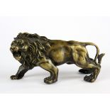 A bronze figure of a lion, L. 15cm.
