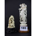 An early 20th century Indian carved figure of a deity, with a further Chinese ivory figure,