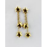 A pair of 9ct yellow gold star shaped drop earrings, L. 4cm.