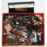 A box of costume jewellery.