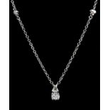 An 18ct white gold diamond solitaire pendant on an 18ct white gold chain. Approx. 0.25ct. Chain