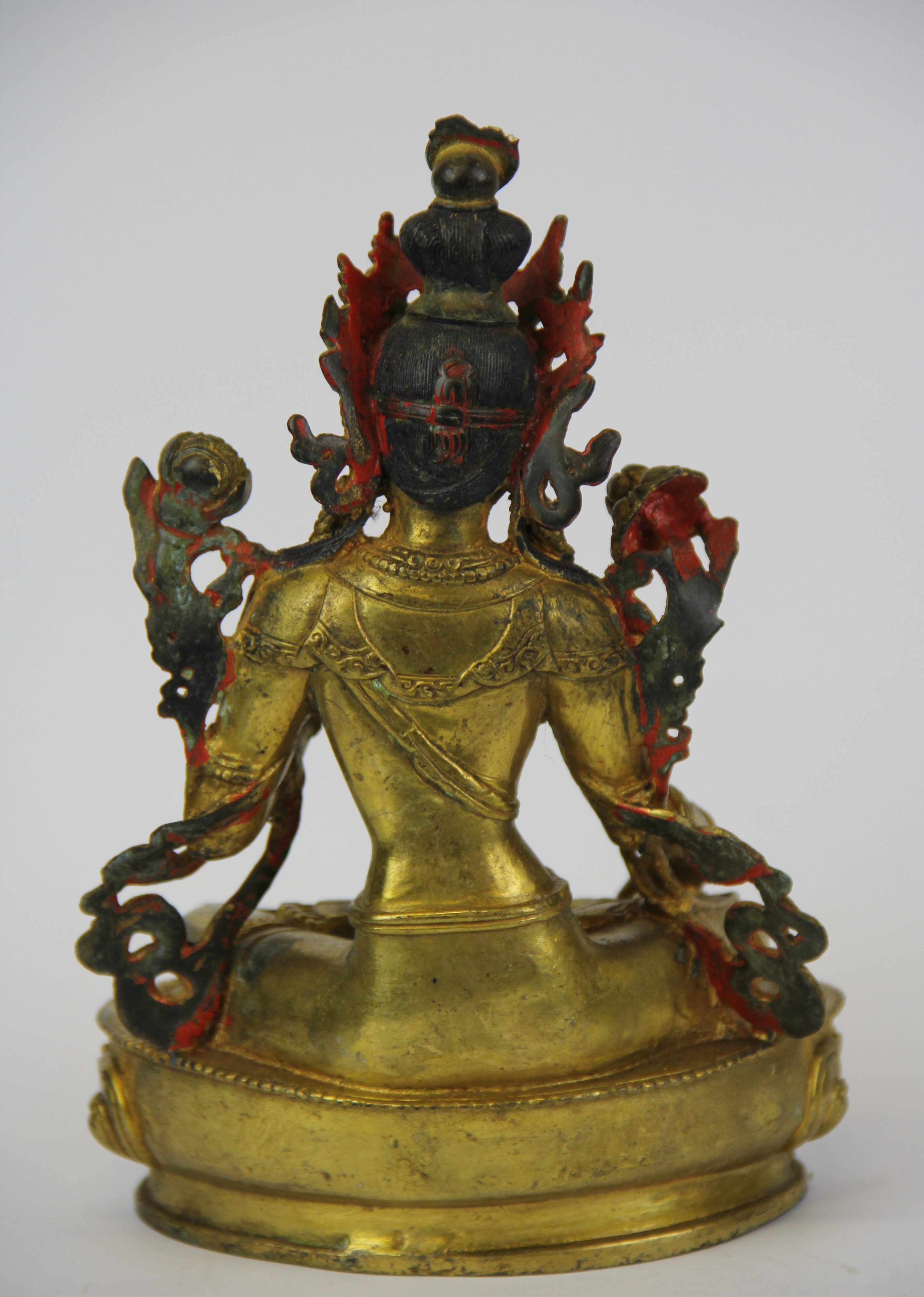 A Tibetan gilt bronze figure of the seated Tara, H. 22cm. - Image 2 of 3