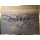 A framed print on canvas of a Lancaster bomber by Gerald Coulson (British), framed size 79 x 60cm.