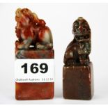 Two Chinese carved soapstone seals in the shape of lion dogs, H. 8cm 9cm.