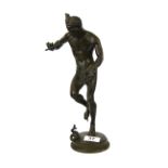 A 19th Century cast bronze figure of a snake charmer, H. 32cm.