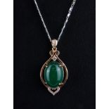 An 18ct white gold plated necklace with a silver 925 silver rose gilt jade and white stone pendant.