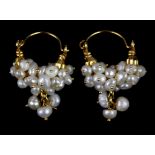 A pair of yellow metal (tested high carat gold) pearl set drop earrings, L. 4cm.