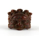 A Tibetan carved horn tribal man's ring, (X).