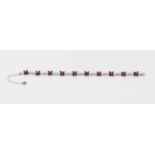 A 925 silver marquise cut ruby set flower shaped bracelet, L. 21cm.