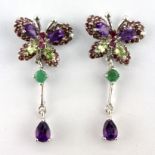 A pair of 925 silver butterfly shaped drop earrings set with rodolite garnets, amethysts, ruby,