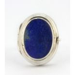 A 925 silver lapis lazuli set locket ring, (M).