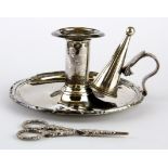 A 19th Century silver plated chamber stick and candle snuffer, together with a pair of ornate