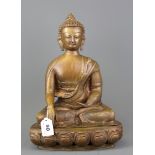 A bronze figure of the seated Buddha, H. 36cm.