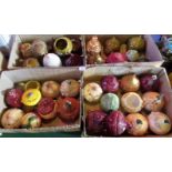 Four boxes containing a large collection of onion shaped bowls.