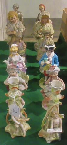 A collection of Continental figurines, consisting of six various couples,