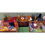 A large quantity of miscellaneous coloured glassware, to include: comports, vases, candlesticks,