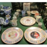 A large quantity of commemorative china, to include: three wall plates, mugs,