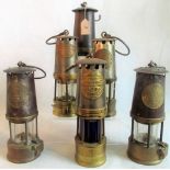 A collection of six 20th century miner's lamps, to include: Eccles Protector, John Davis & Son,