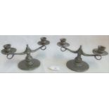 A pair of Tudric for Liberty Art Nouveau double branch candlesticks.