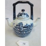 A late 19th/early 20th century Chinese blue & white porcelain double spout wine pot,