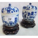 A pair of Chinese late Qing dynasty, blue & white porcelain rice wine warmers,