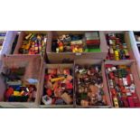 Seven boxes of miscellaneous play worn toys, together with building blocks,