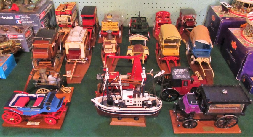 A collection of eighteen scratch built models, to include: a Wells Fargo Wild West stagecoach,