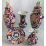 A pair of late 19th century Japanese Imari lidded vases,