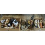 A large quantity of china and plaster canine figures,