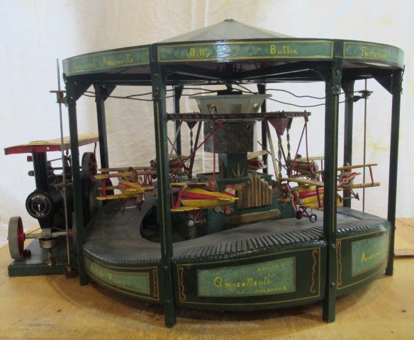 A Mamod steam driven aviation fairground carousel.