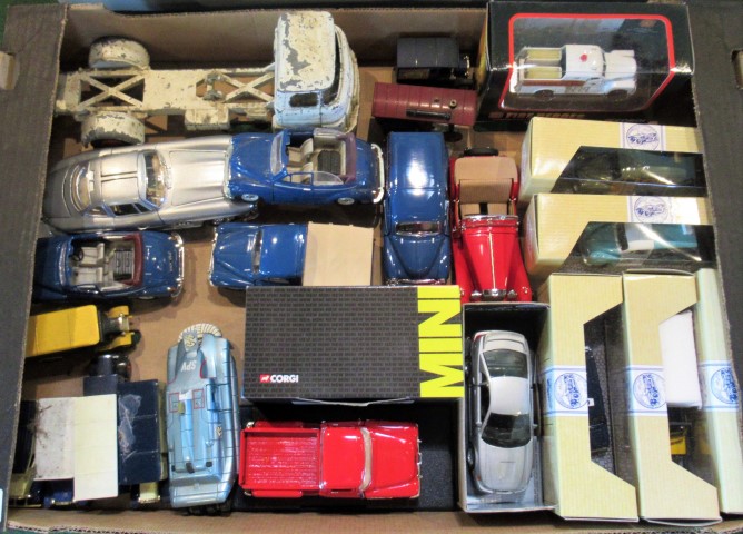 A box containing a quantity of miscellaneous toys, to include: two Corgi Mini Cooper,