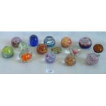 A Caithness 'Marguerite 474' paperweight, together with various and similar paperweights.
