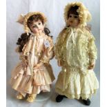 Two 20th century German porcelain headed dolls.
